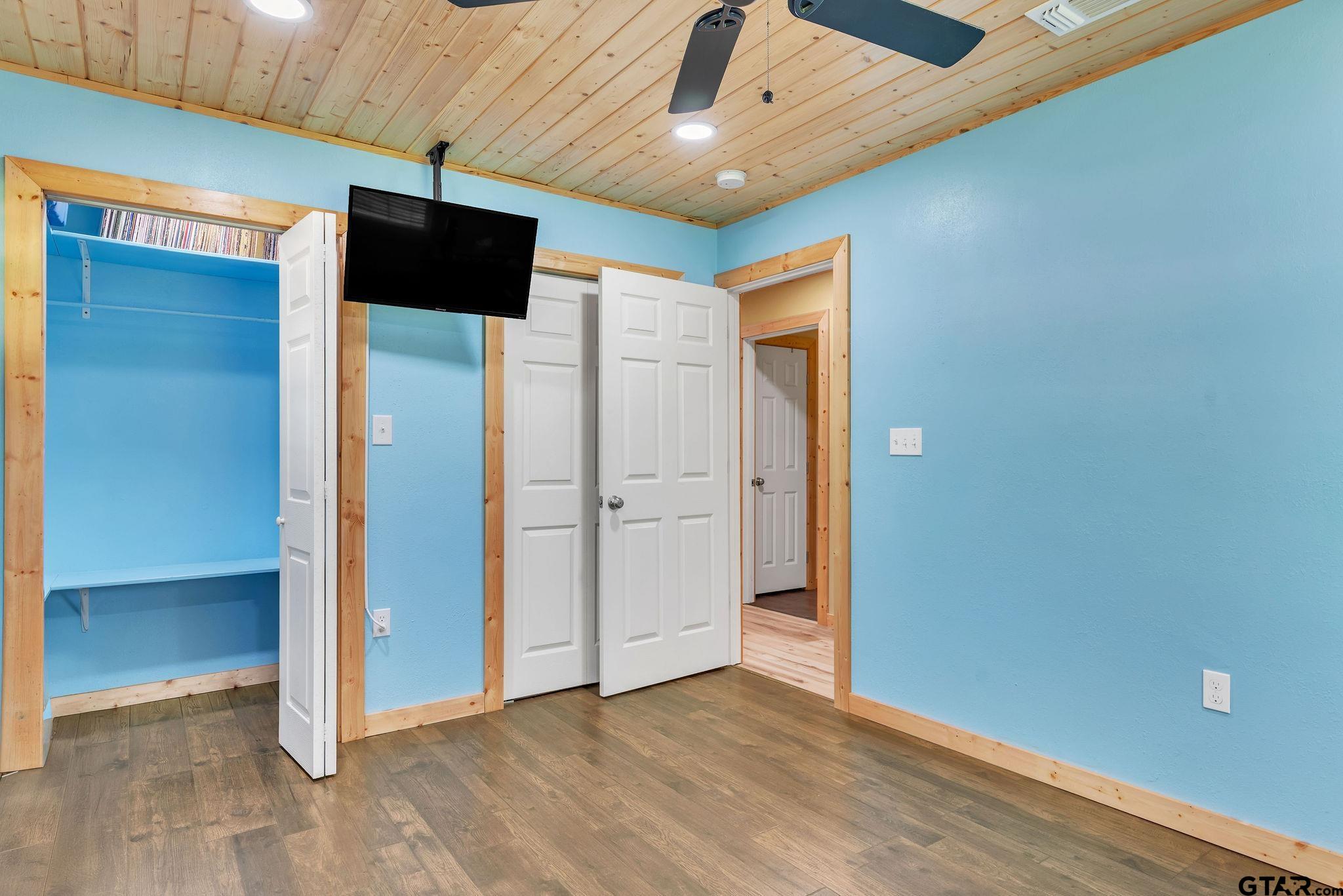 519 E Well Naples, TX 75568 - Photo 21 of 48 a view of empty room with wooden floor