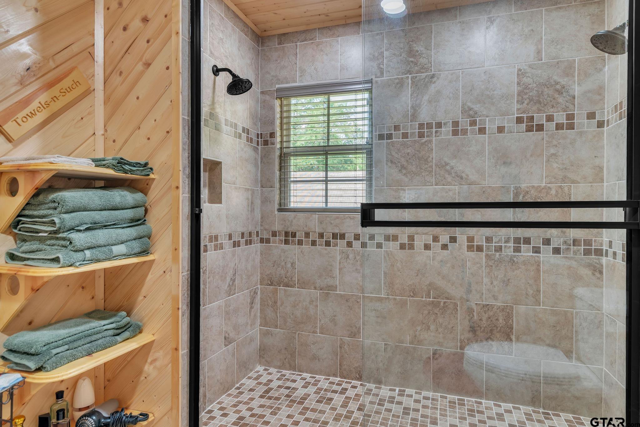 519 E Well Naples, TX 75568 - Photo 23 of 48 a bathroom with a shower
