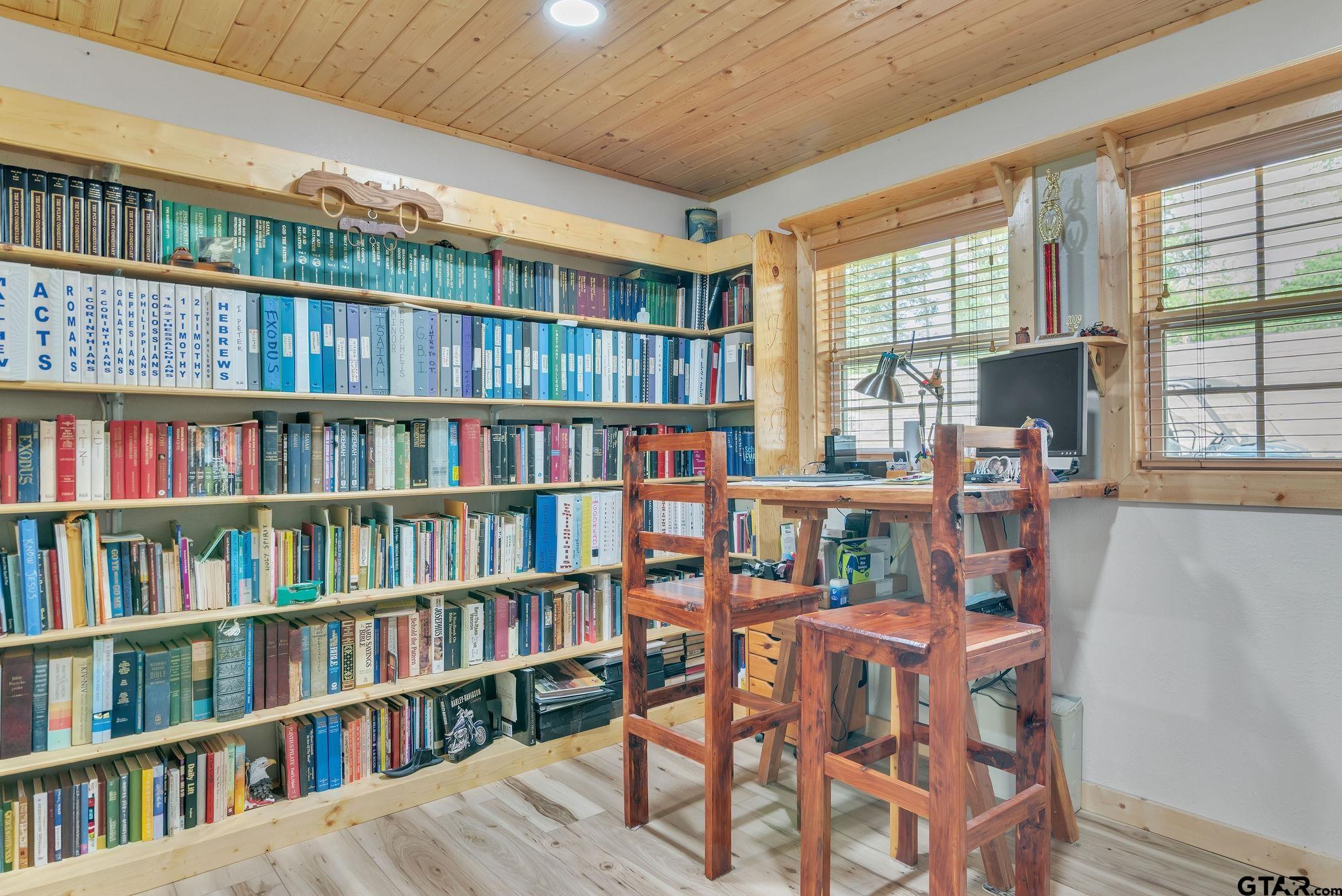 519 E Well Naples, TX 75568 - Photo 29 of 48 a dining room with furniture a book shelves