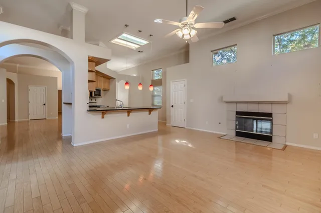 a view of a livingroom with a kitchen