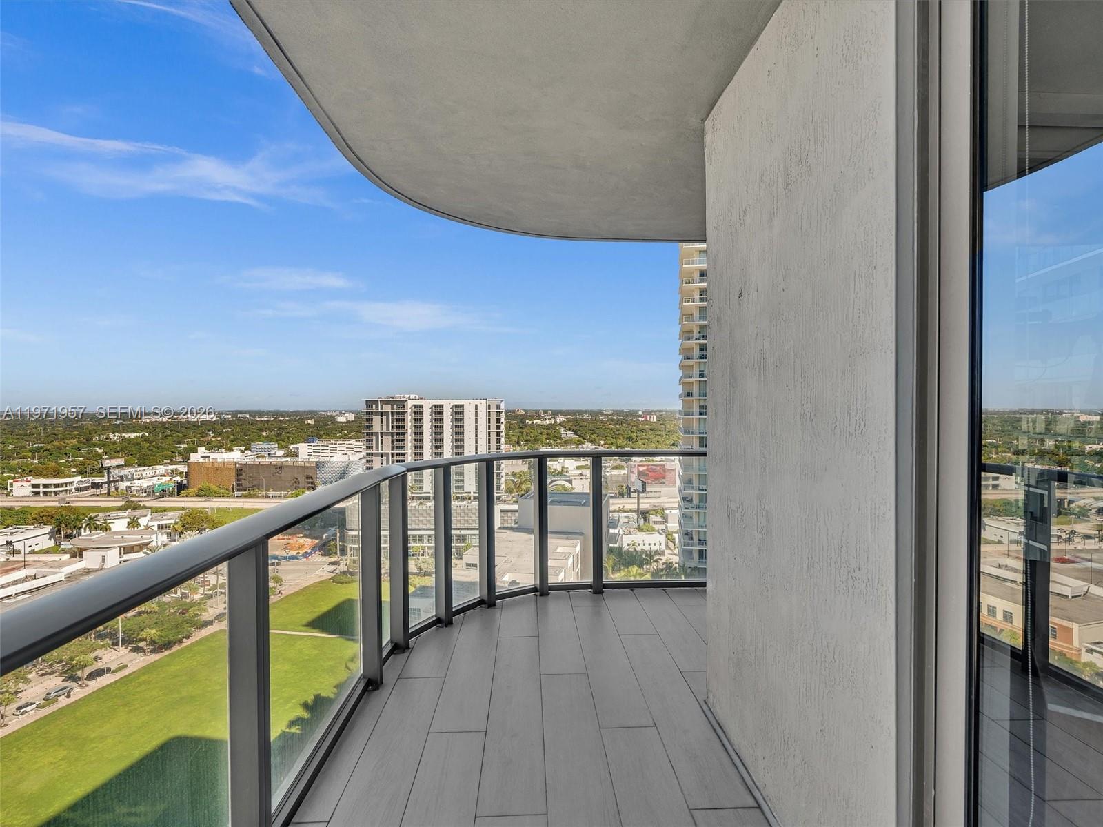 121 Northeast 34th Street, Unit 2016 Miami, FL 33137 - Photo 19 of 55 a view of a balcony with an ocean view