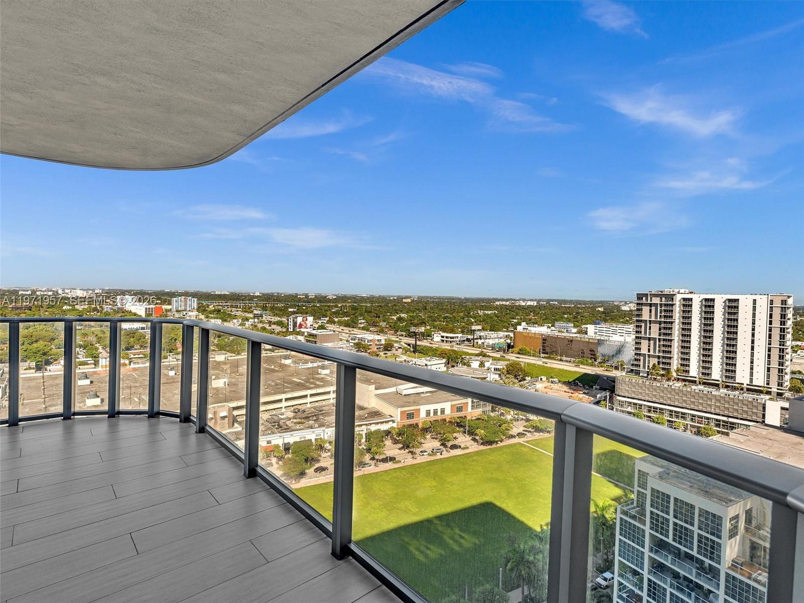 121 Northeast 34th Street, Unit 2016 Miami, FL 33137 - Photo 22 of 55 a view of a balcony with an ocean view