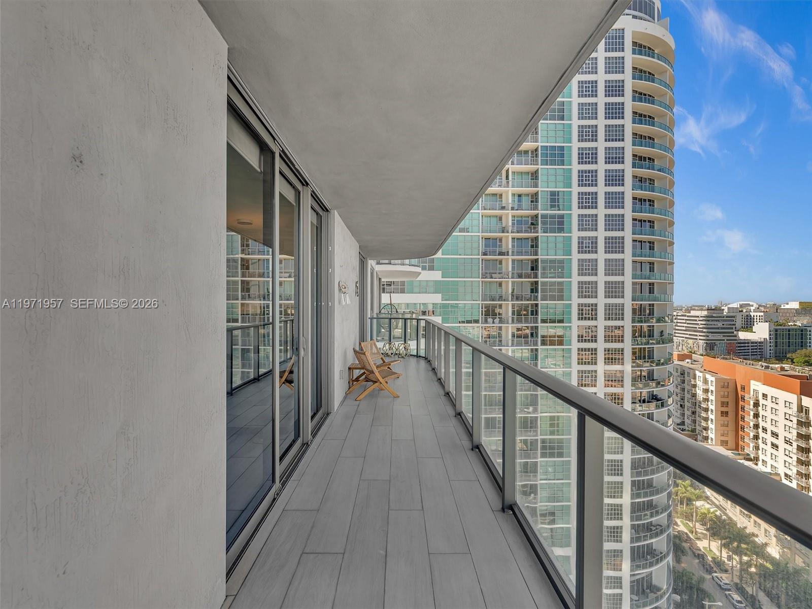 121 Northeast 34th Street, Unit 2016 Miami, FL 33137 - Photo 25 of 55 a view of balcony with wooden floor