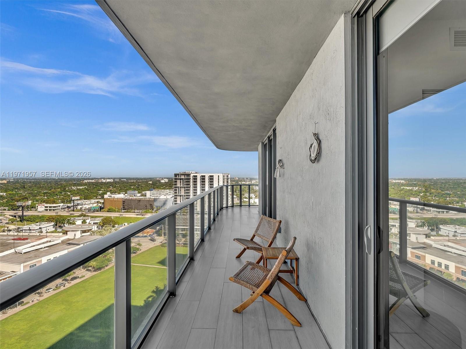 121 Northeast 34th Street, Unit 2016 Miami, FL 33137 - Photo 28 of 55 a view of a balcony with city view