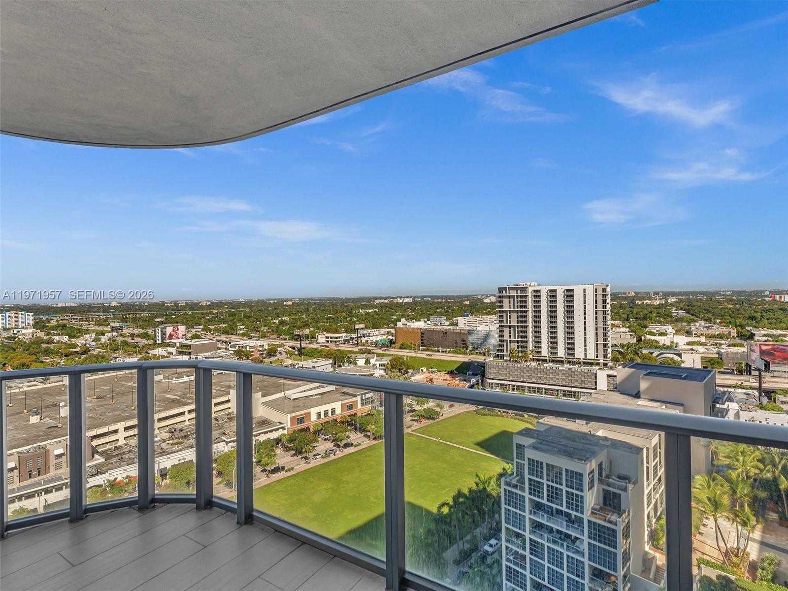 121 Northeast 34th Street, Unit 2016 Miami, FL 33137 - Photo 32 of 55 a view of a balcony with an ocean