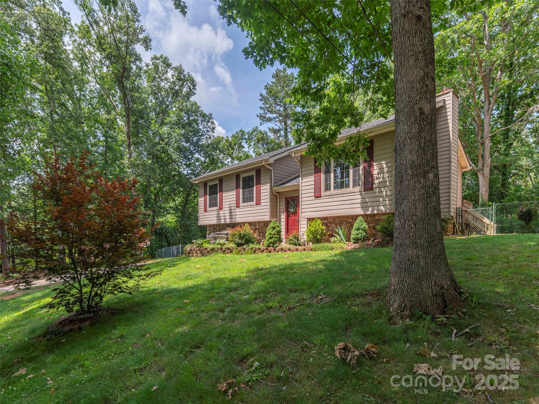623 Nellie John Drive Clyde, NC 28721 - Photo 25 of 25 a front view of a house with a yard
