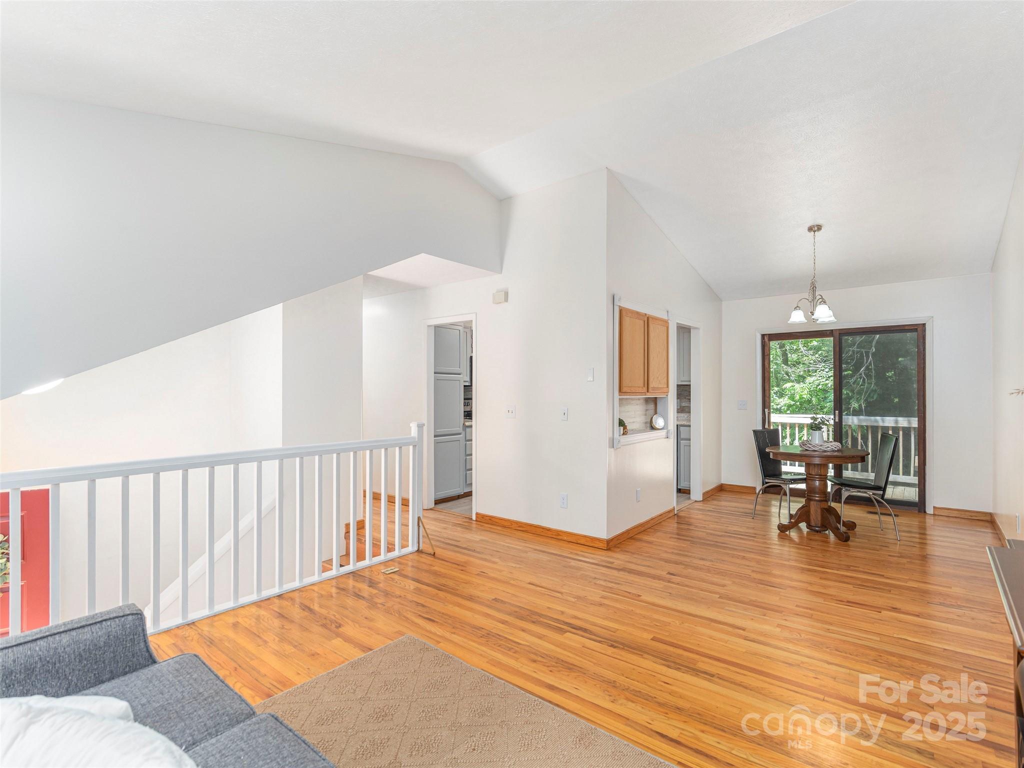 623 Nellie John Drive Clyde, NC 28721 - Photo 8 of 25 a bedroom with furniture and a window
