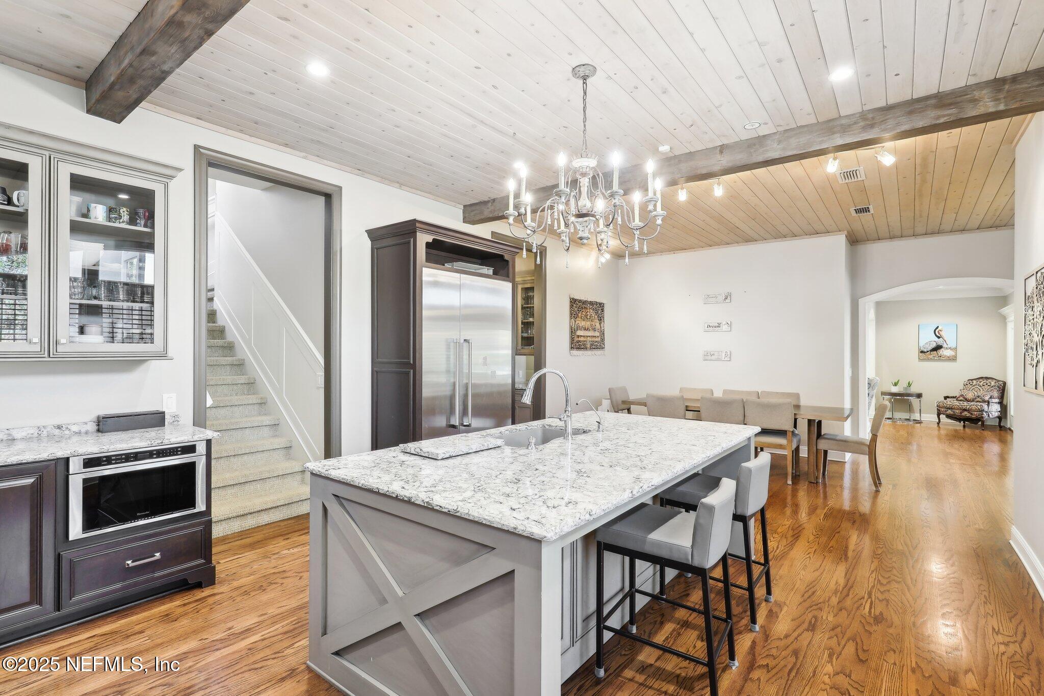 1836 Commodore Point Drive Fleming Island, FL 32003 - Photo 15 of 75 a view of a dining room with furniture and wooden floor