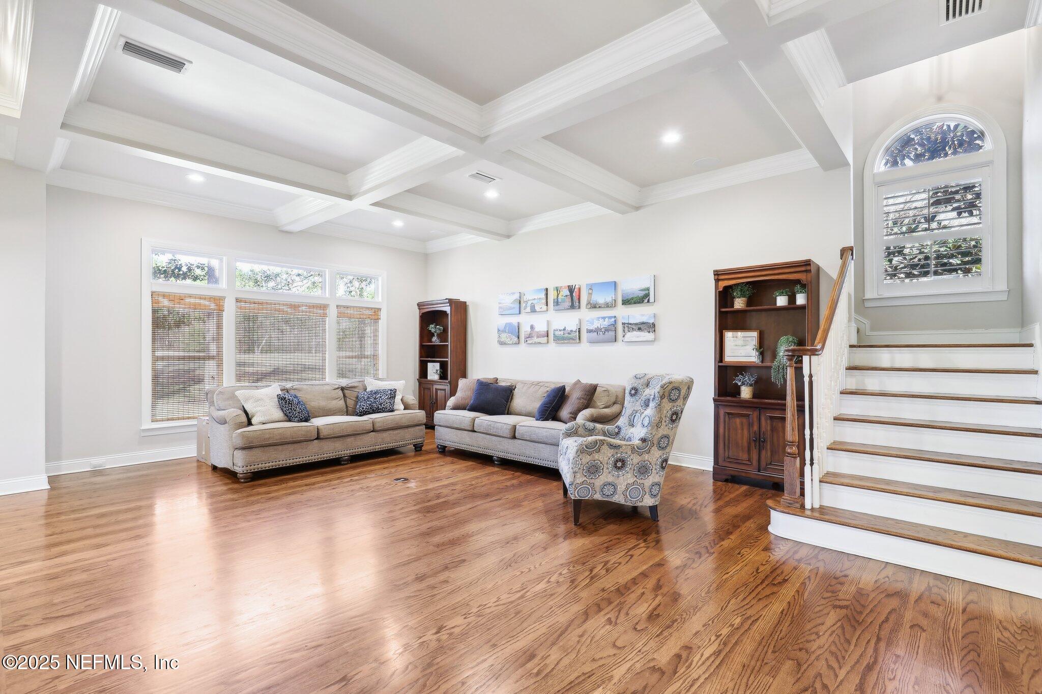 1836 Commodore Point Drive Fleming Island, FL 32003 - Photo 16 of 75 a living room with furniture and wooden floor