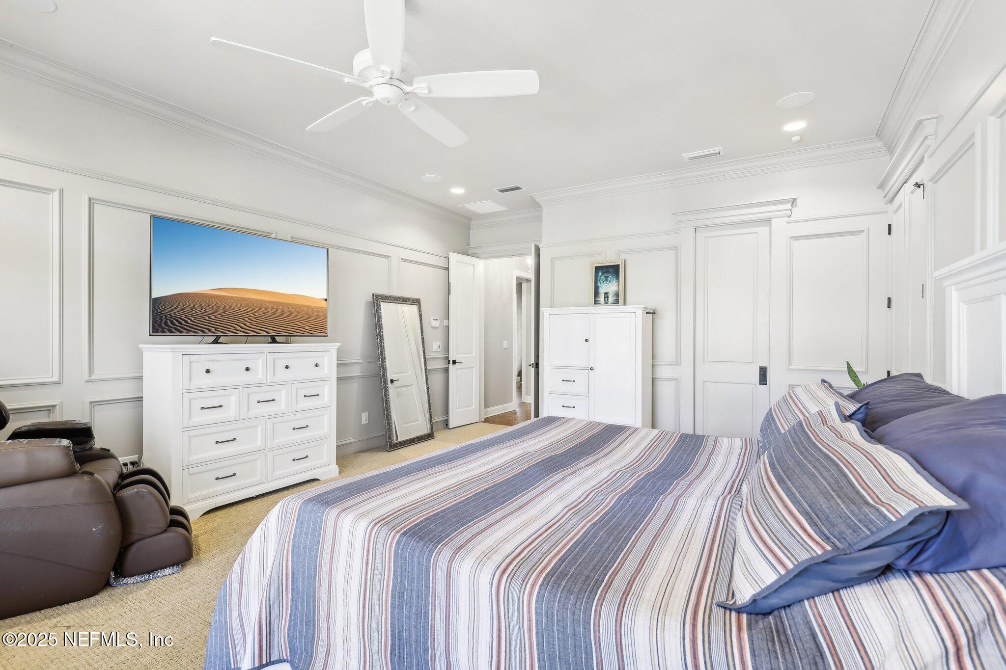 1836 Commodore Point Drive Fleming Island, FL 32003 - Photo 21 of 75 a bedroom with a bed and closet