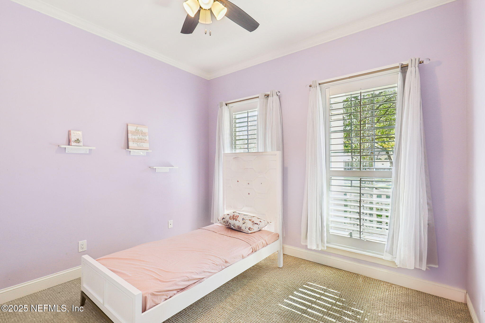 1836 Commodore Point Drive Fleming Island, FL 32003 - Photo 25 of 75 a bedroom with a bed and a window