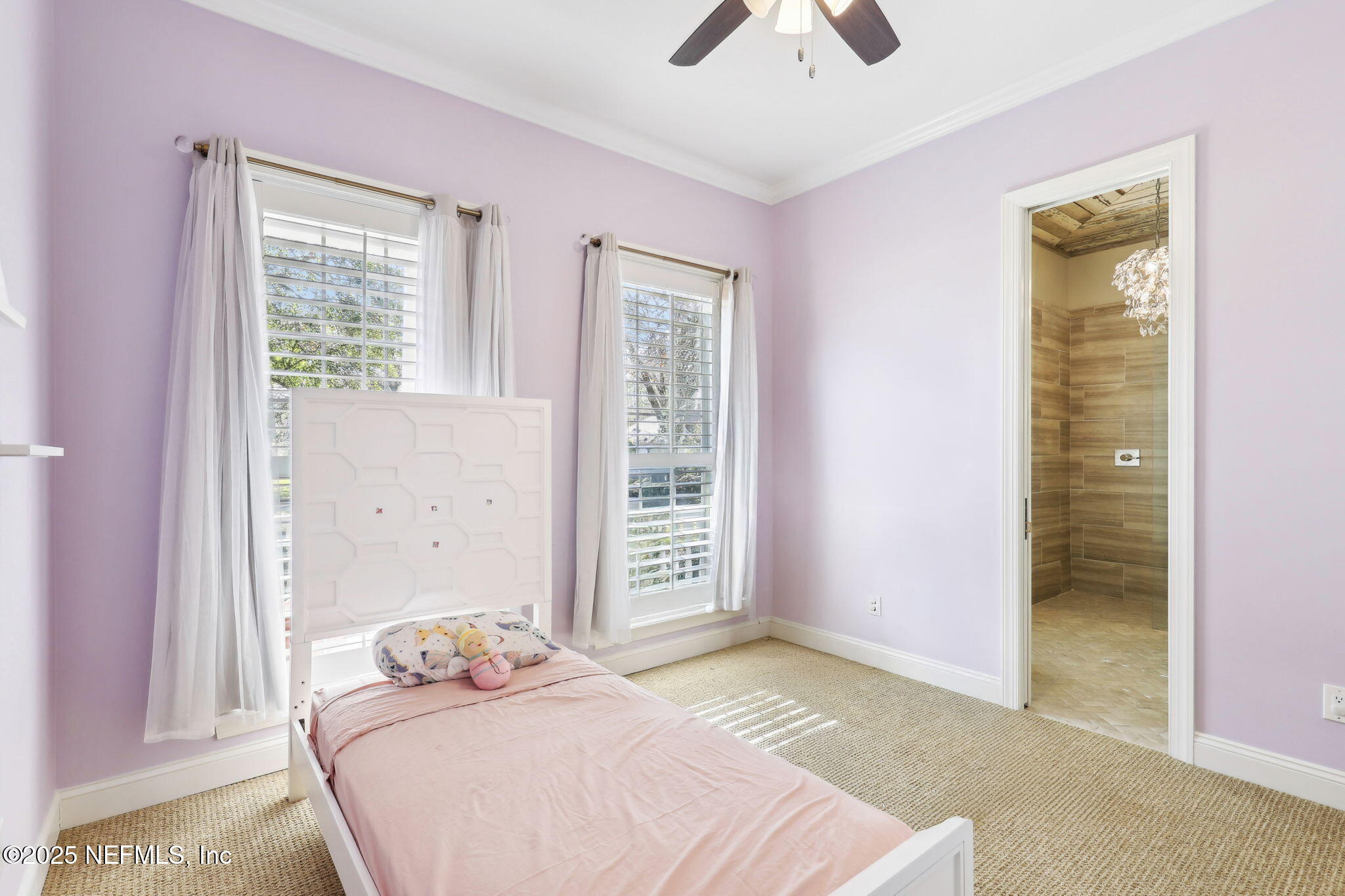 1836 Commodore Point Drive Fleming Island, FL 32003 - Photo 26 of 75 a bedroom with a bed and a window