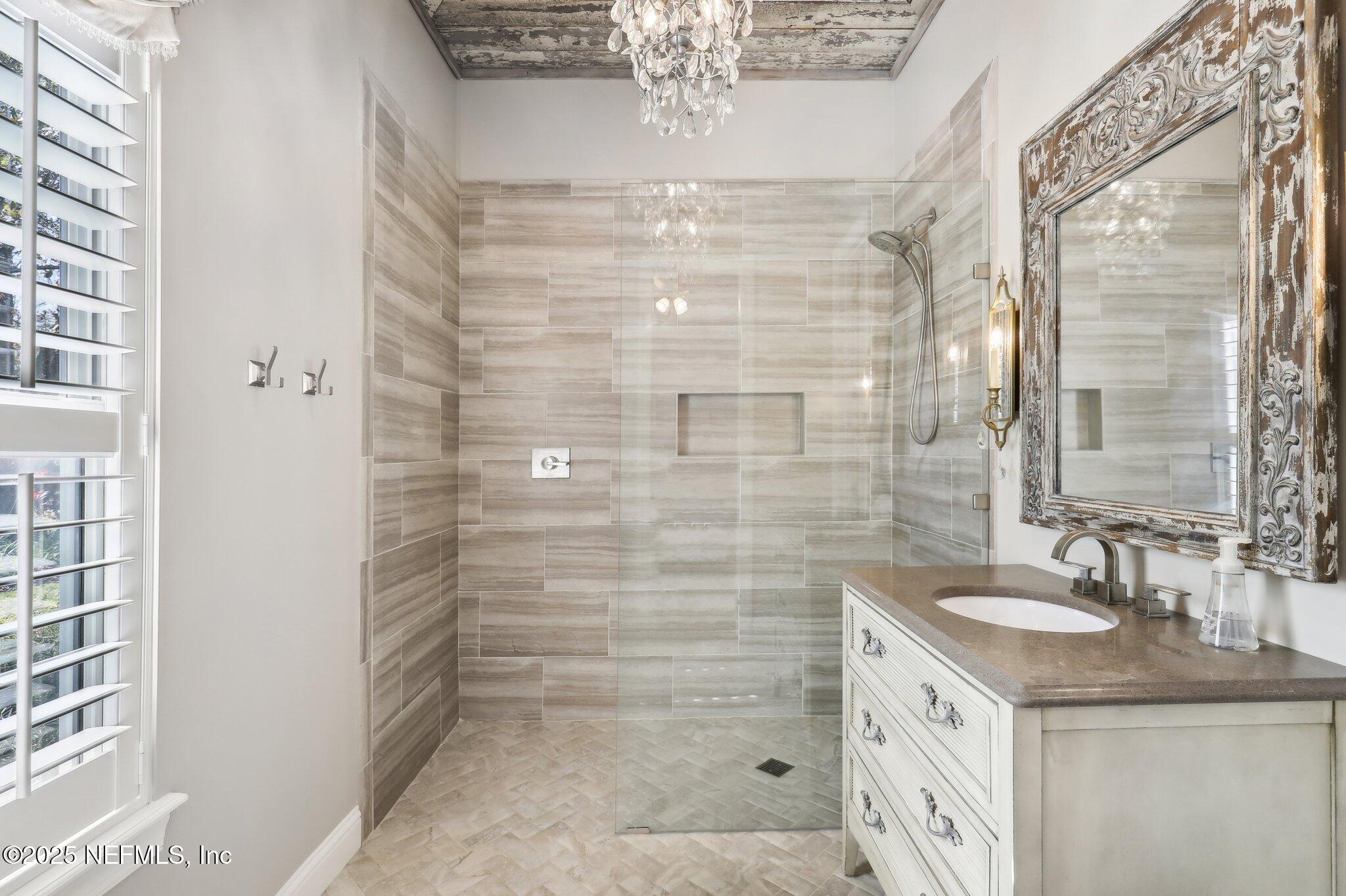 1836 Commodore Point Drive Fleming Island, FL 32003 - Photo 27 of 75 a bathroom with a shower and a sink