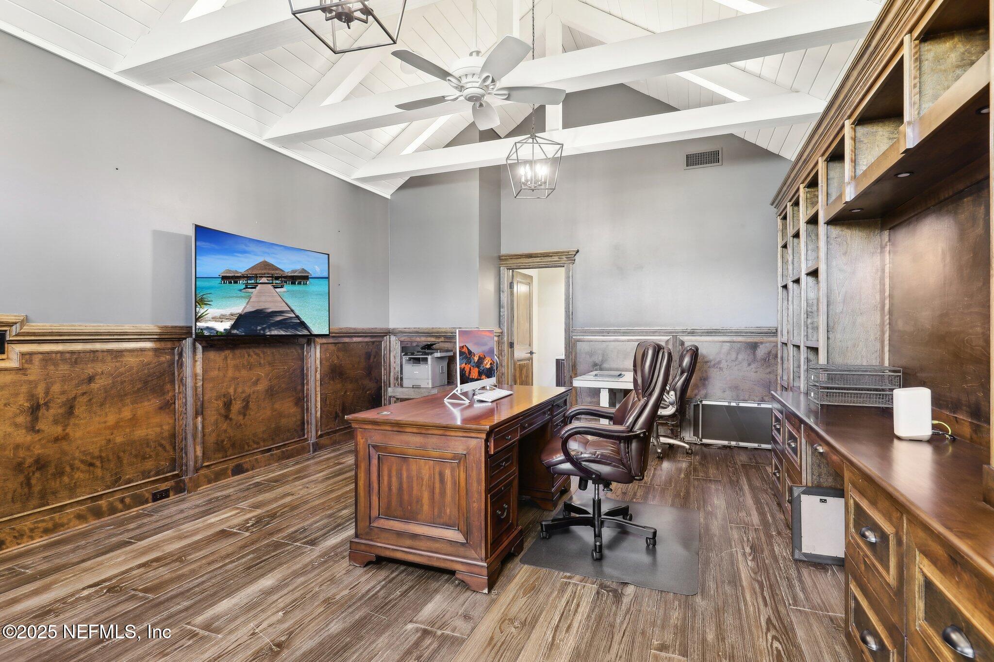 1836 Commodore Point Drive Fleming Island, FL 32003 - Photo 31 of 75 a view of a workspace with furniture wooden floor and a chandelier