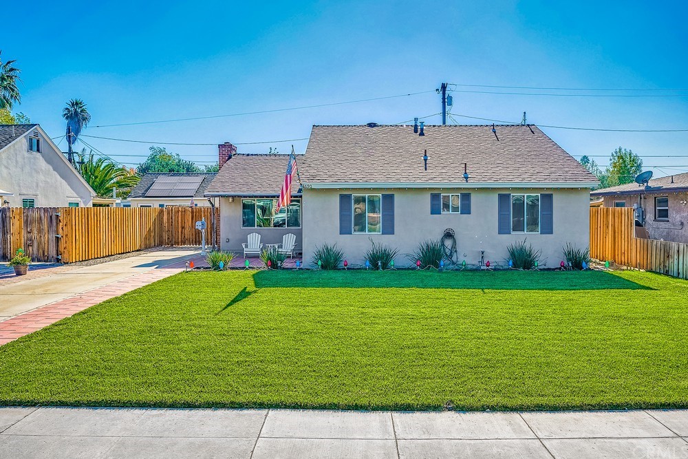 3690 Yosemite Way Riverside, CA 92506 - Photo 1 of 1 a front view of a house with garden