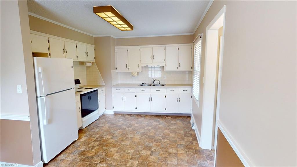 205 Fowler Circle Dobson, NC 27017 - Photo 11 of 29 View of kitchen from dining area