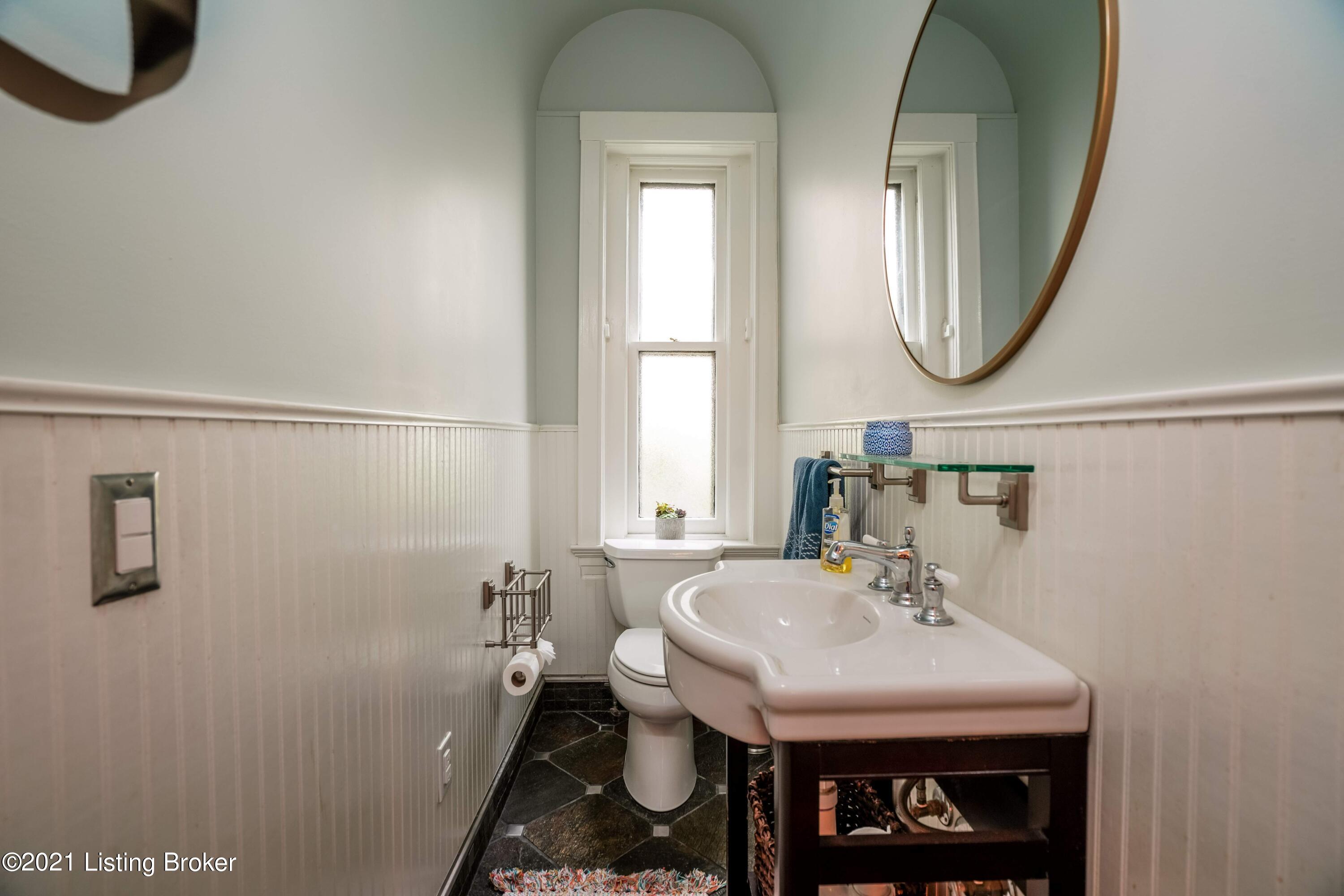 1279 Cherokee Road Louisville, KY 40204 - Photo 20 of 52 Renovated half bath serves your guests on the first floor.
