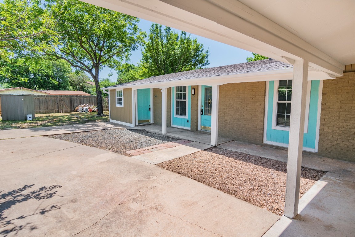 2913 East 51st Street, Unit B Austin, TX 78723 - Photo 2 of 12 a view of a house with a yard and potted plants
