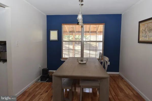 a kitchen with a sink appliances and cabinets