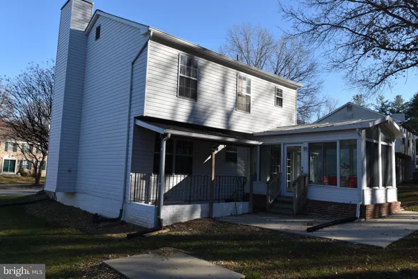 a view of a back yard of the house