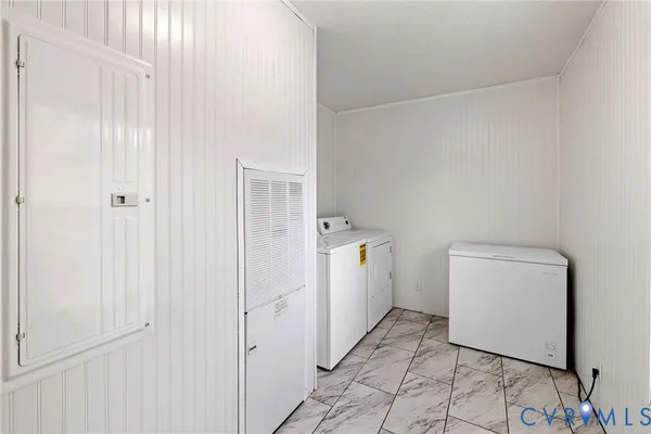 a room with a washer and dryer