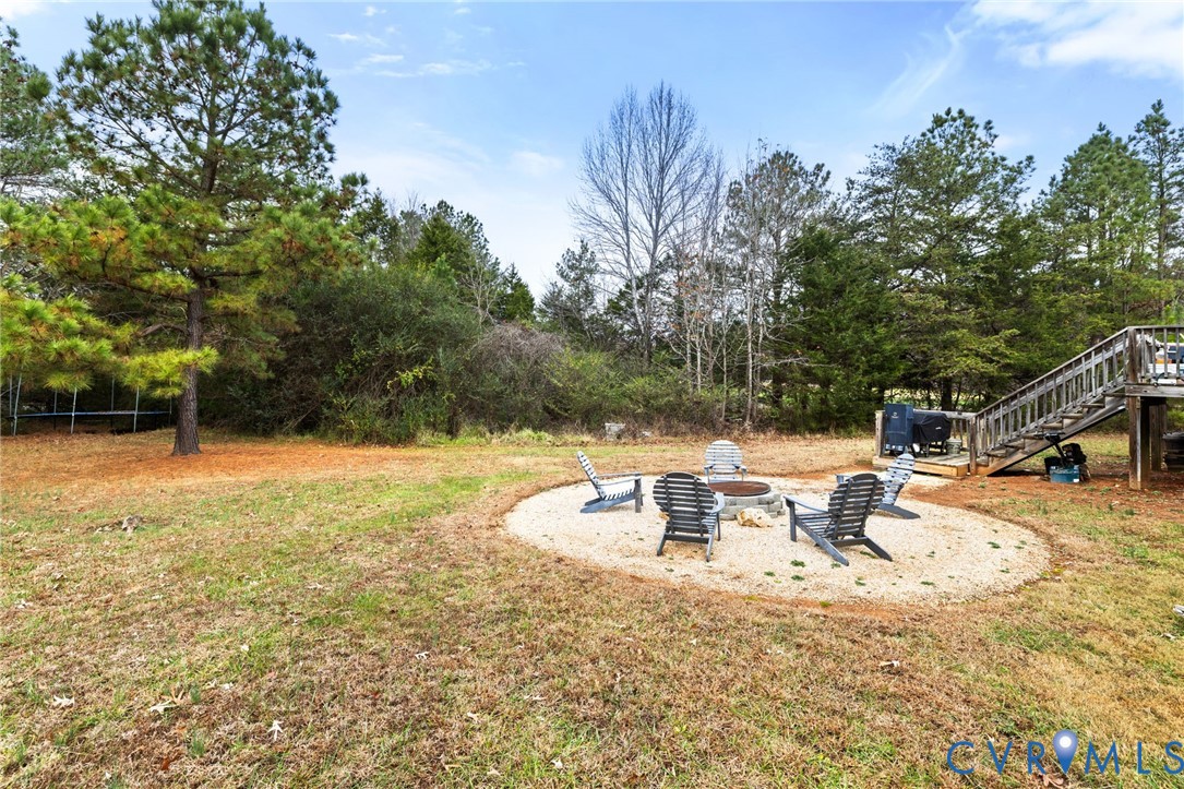 11391 Watkins Road Rockville, VA 23146 - Photo 28 of 28 a view of backyard with swimming pool and seating space