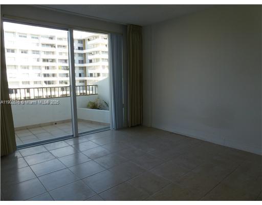 199 Ocean Ln Drive, Unit 702 Key Biscayne, FL 33149 - Photo 4 of 8 a view of an empty room and window
