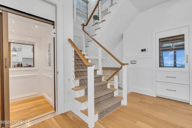 a spacious bedroom with a large bed and a couch