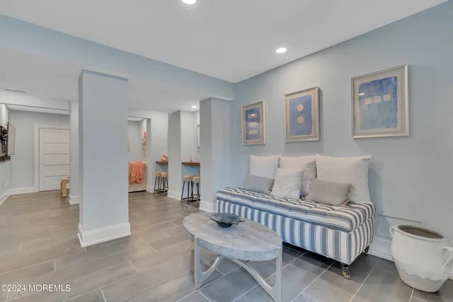 a view of a livingroom with furniture and a couch