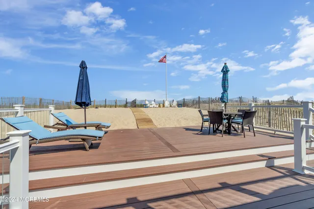 a view of a building with sitting area