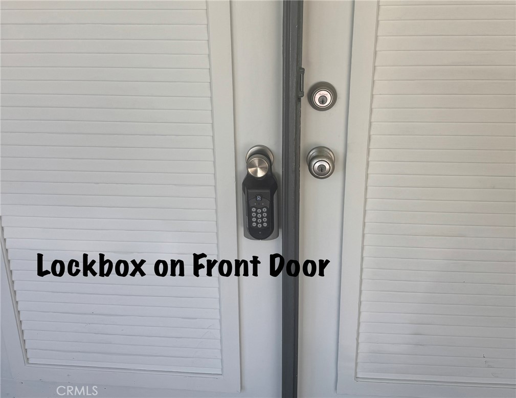 211 Benicia Road Diamond Bar, CA 91765 - Photo 34 of 36 LOCKBOX ON FRONT DOOR