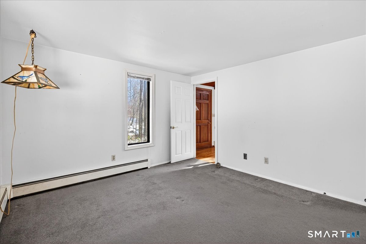 18 Deer Path Lane North Branford, CT 06471 - Photo 12 of 33 an empty room with windows