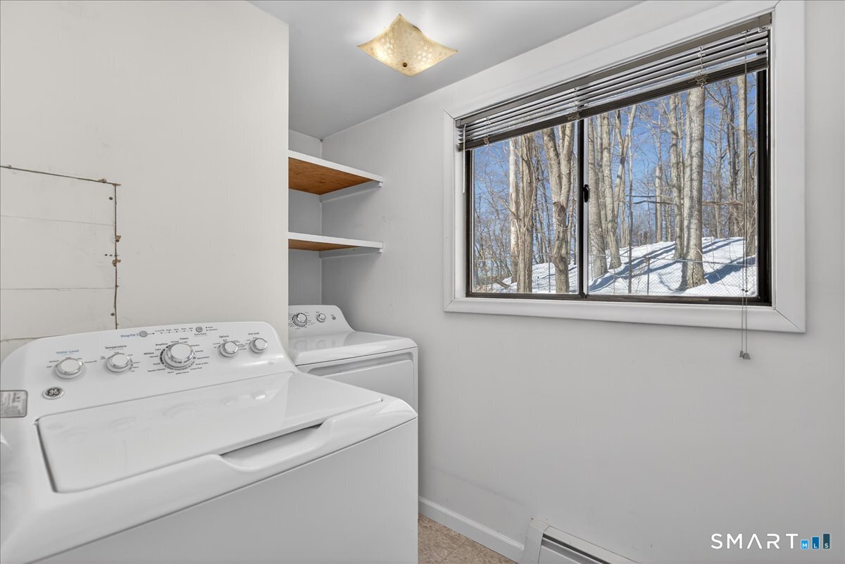 18 Deer Path Lane North Branford, CT 06471 - Photo 14 of 33 a utility room with dryer and washer
