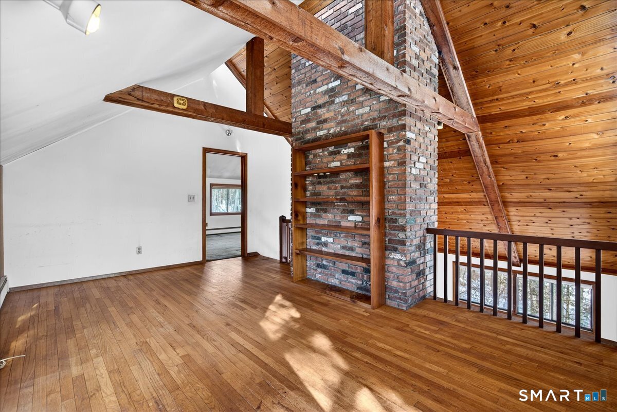 18 Deer Path Lane North Branford, CT 06471 - Photo 17 of 33 a view of wooden floor with a window