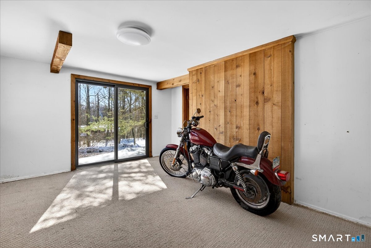 18 Deer Path Lane North Branford, CT 06471 - Photo 20 of 33 a view of a room with gym equipment