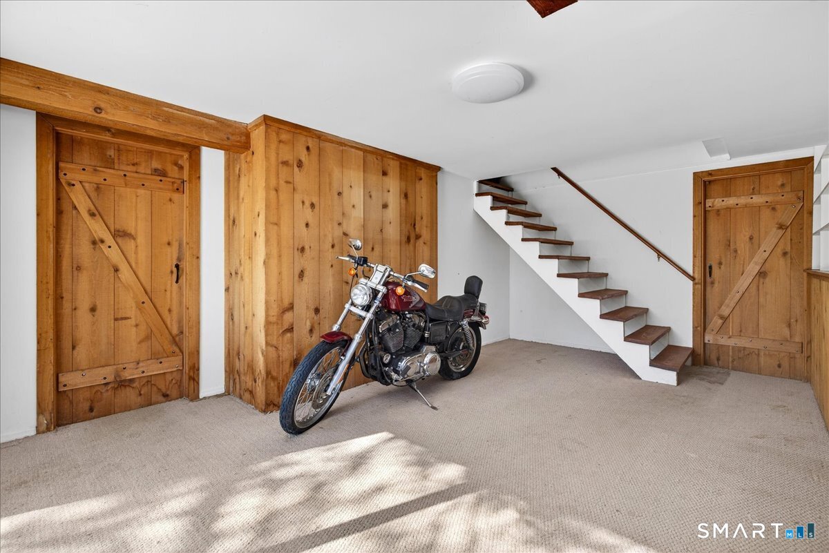 18 Deer Path Lane North Branford, CT 06471 - Photo 21 of 33 a view of a room with gym equipment