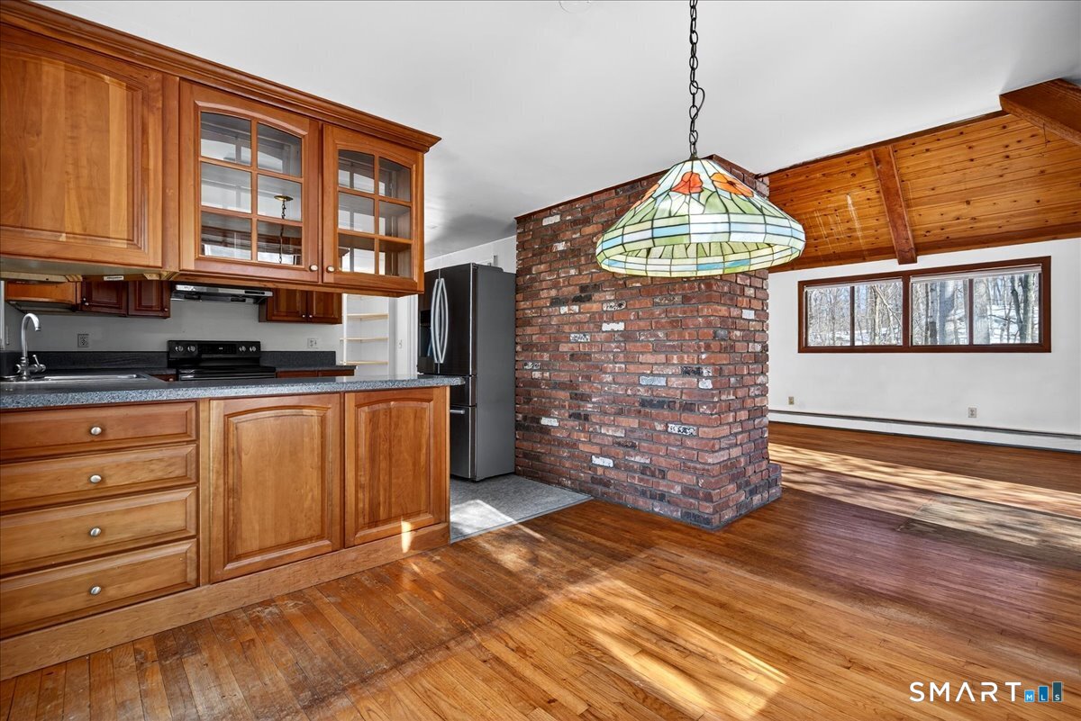 18 Deer Path Lane North Branford, CT 06471 - Photo 7 of 33 a view of an entryway with wooden floor