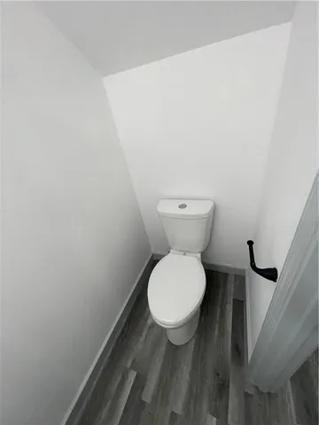 a bathroom with a toilet and a sink