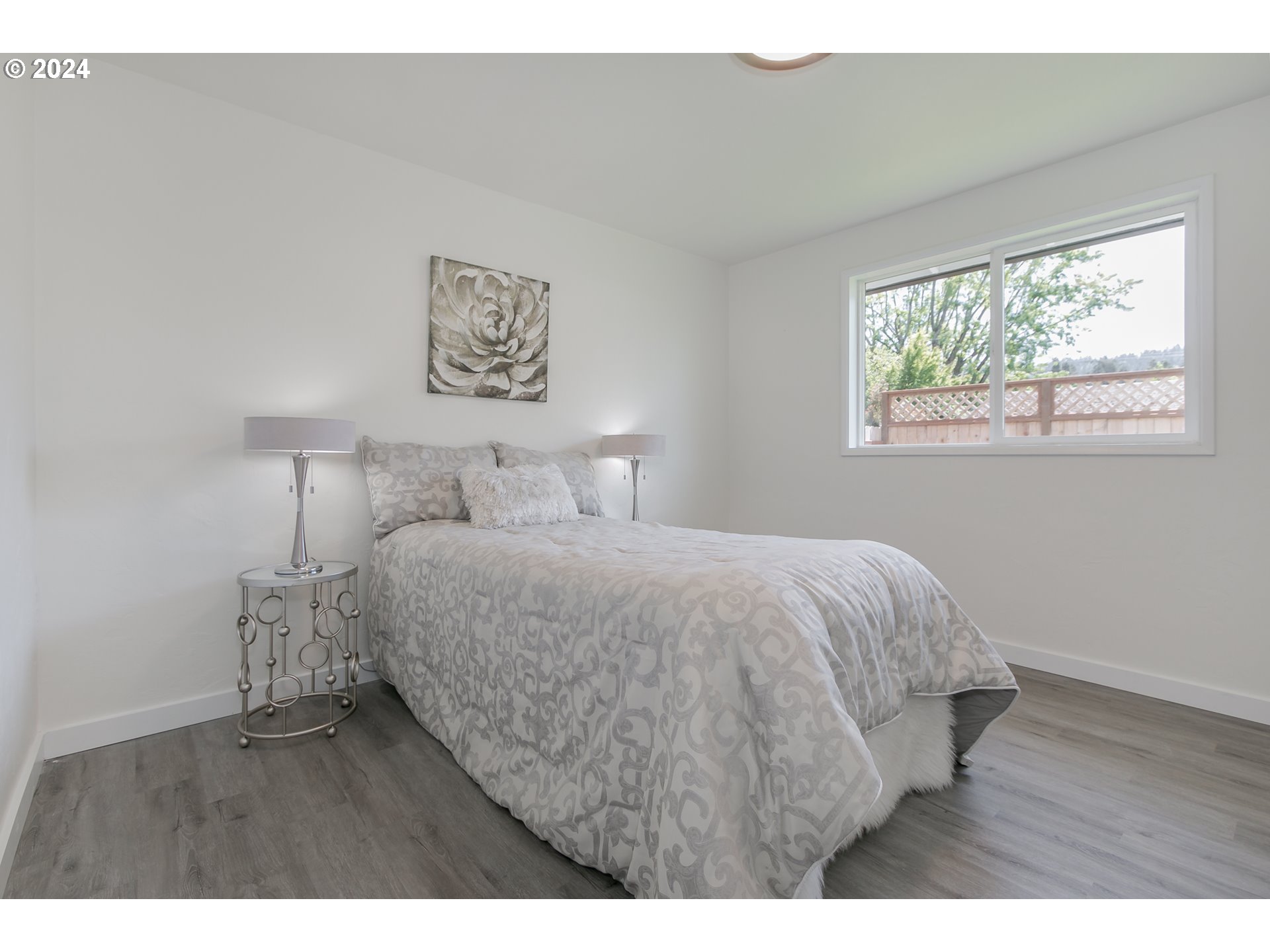 6757 A Street Springfield, OR 97478 - Photo 13 of 25 a bedroom with a bed and a window