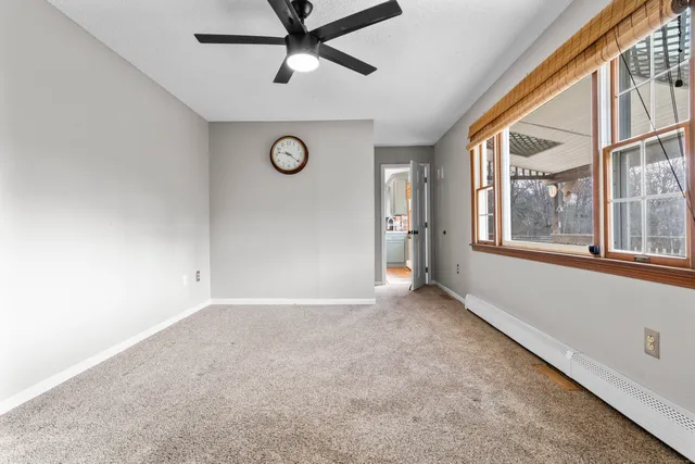 a bathroom with a sink a shower and a mirror