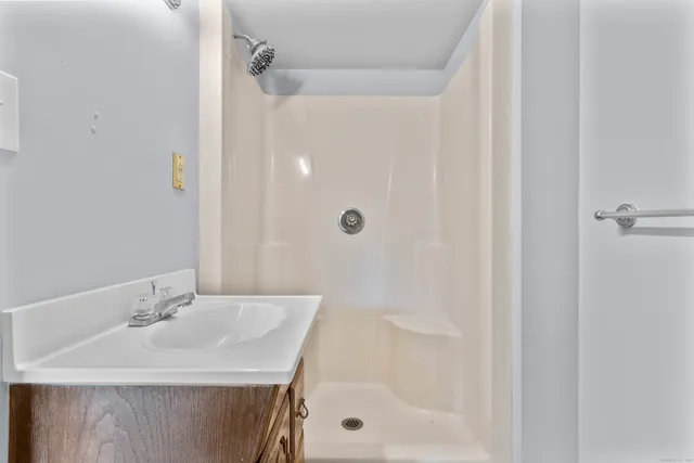 a view of an empty room with a window