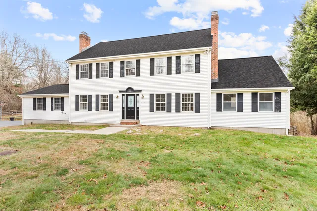 a kitchen with a sink cabinets and window