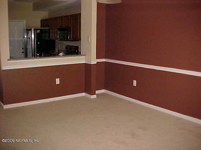 10200 Belle Rive Boulevard, Unit 4702 Jacksonville, FL 32256 - Photo 5 of 10 a view of an empty room