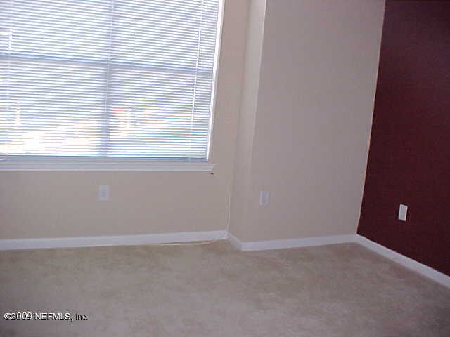 10200 Belle Rive Boulevard, Unit 4702 Jacksonville, FL 32256 - Photo 8 of 10 a view of a small space with a window