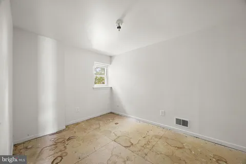 a view of a room with a window