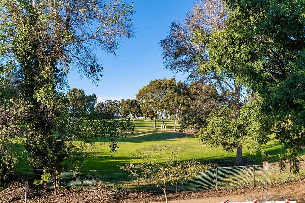 2742 A Street, Unit 202 San Diego, CA 92102 - Photo 19 of 22 a view of a yard with an trees