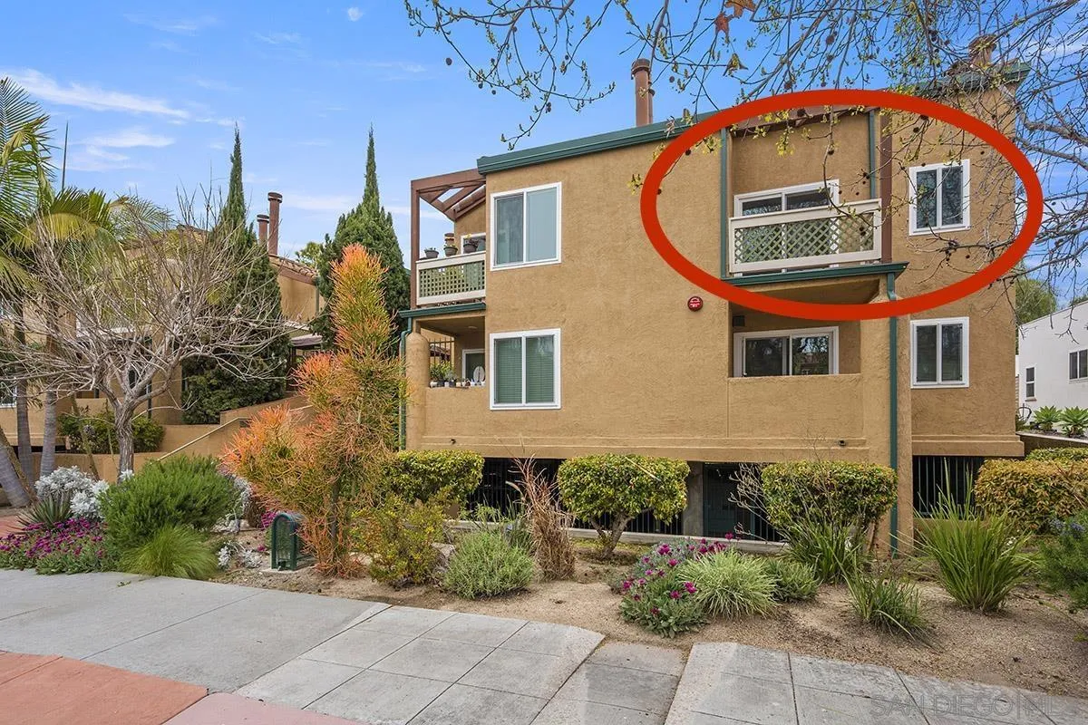 2742 A Street, Unit 202 San Diego, CA 92102 - Photo 3 of 22 a front view of a house with a garden