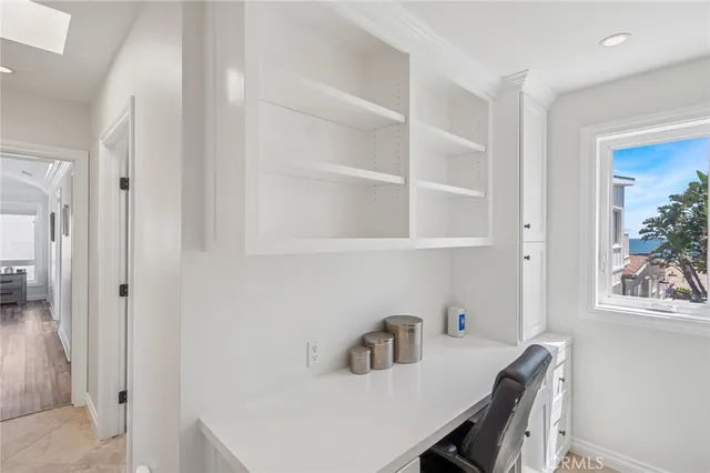 a bathroom with a granite countertop sink toilet a mirror a vanity and shower