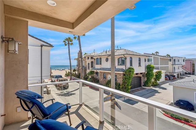 a view of a balcony with chairs