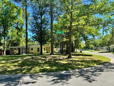 Large corner lot with mature trees